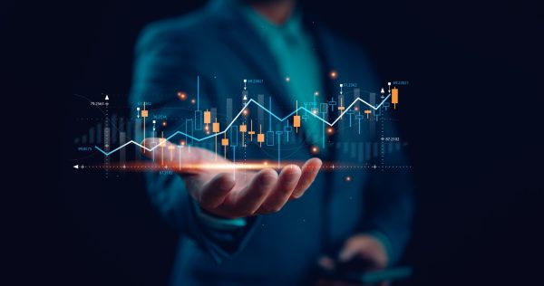 Investor investment Planning and strategy, Stock market, Business growth, progress or success concept. Businessman or trader is showing a growing virtual hologram stock, invest in trading.